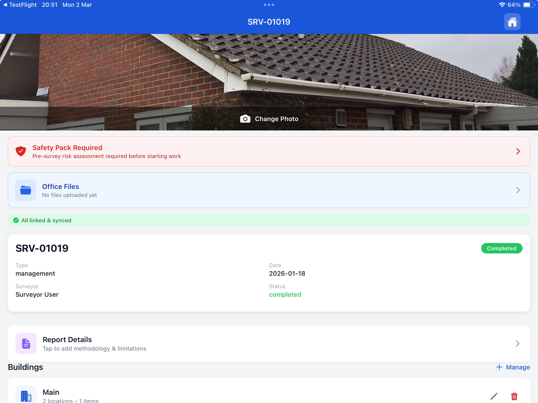 Smart Risk asbestos survey on iPad showing cover photo, safety pack, sync status, and buildings